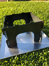 Load image into Gallery viewer, Step 1 of the fire pit assembly - connect the legs into a square using the slots