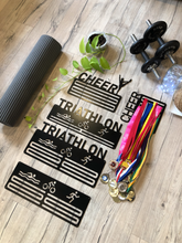 Load image into Gallery viewer, Medal holders Cheer and Triathlon versions in matt black