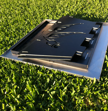 Load image into Gallery viewer, The fire pits flat pack for storage when not in use.