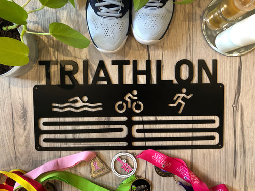 Triathlon medal holder. matt black 6 bars. swimm, cycle, run figures with TRIATHLON text at top.